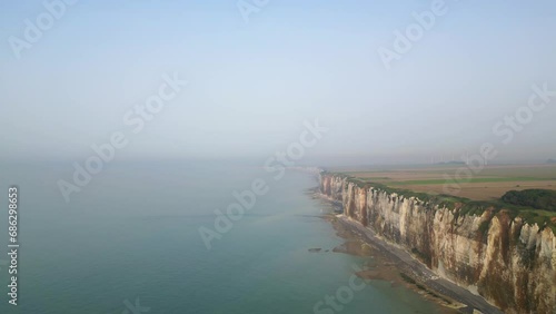 Wallpaper Mural Cliffs of Normandy, France. 4k Drone video of the Atlantic coast. French coast surrounded by the Ocean. High white chalk cliffs with green meadows Picturesque panoramic landscape Torontodigital.ca