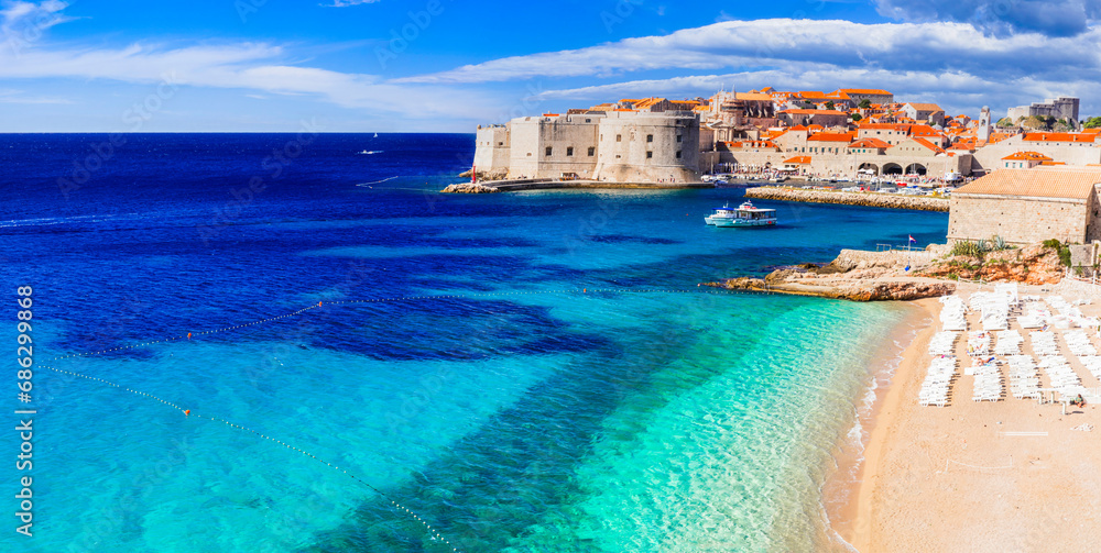 medieval Dubrovnik town - pearl of Adriatic coast in Croatia. Panoramic view with beautiful  sandy beach.