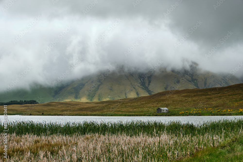 storm clouds over Emma lake in new zealand