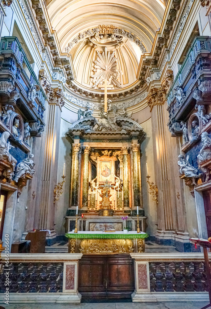 interior of the nave of the Santa Maria dei Miracoli church with the front altar in the Italian city of Rome.