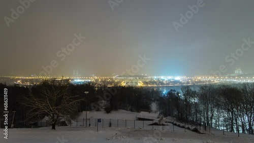 Day to Night Transition Timelapse: Panoramic View of Moscow City, Russia, from Sparrow Hills. Aerial view to illuminated stadium