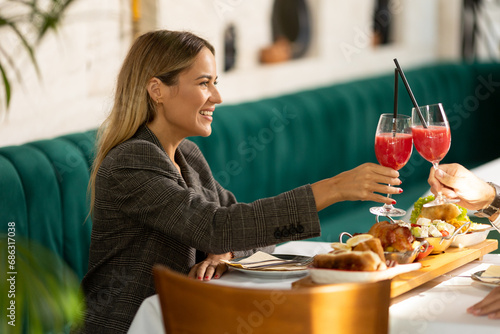 Young couple having lunch a...