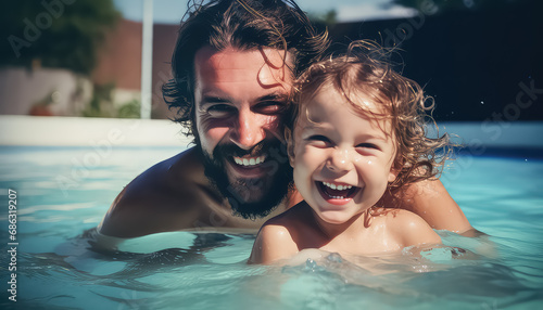 Father with son having fun in the pool