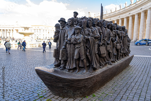 aim, angel, challenge, evangelical, evangelical challenge, everyone, migrant, monument, paul schmalz, peter, reminding, s, square, st peter, welcoming photo