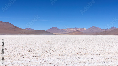 Bolivia, Avaroa National Park. Desert and mountain range on the horizon. photo