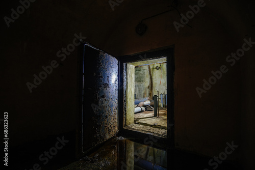 Old dark abandoned dirty Soviet bunker  echo of Cold War