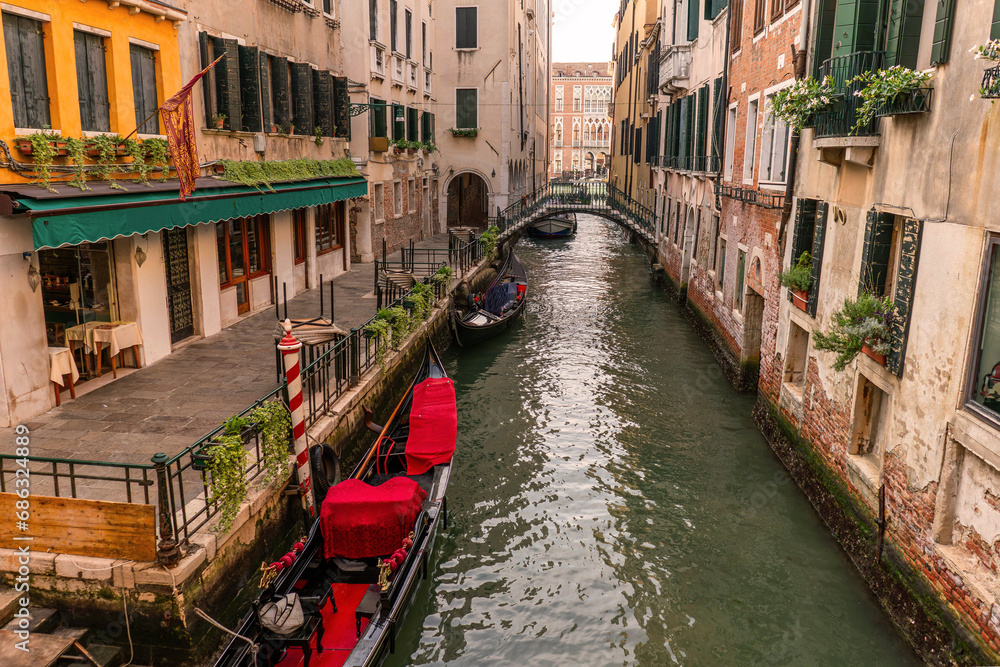 Romantic venice italy canal with traditional gondola in old town
