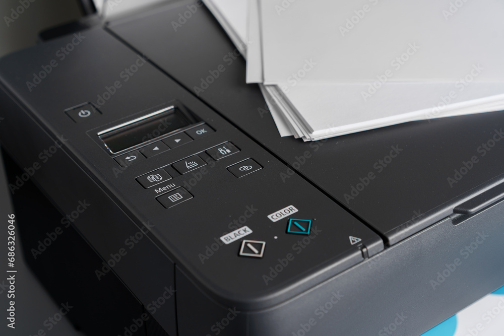 Close up of modern printer in the office Close up of modern printer in the office