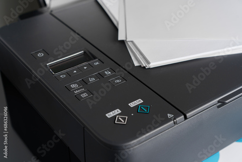 Close up of modern printer in the office