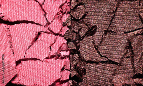 Pink and brown eyeshadow texture background. Cosmetic product crumbled swatch photo