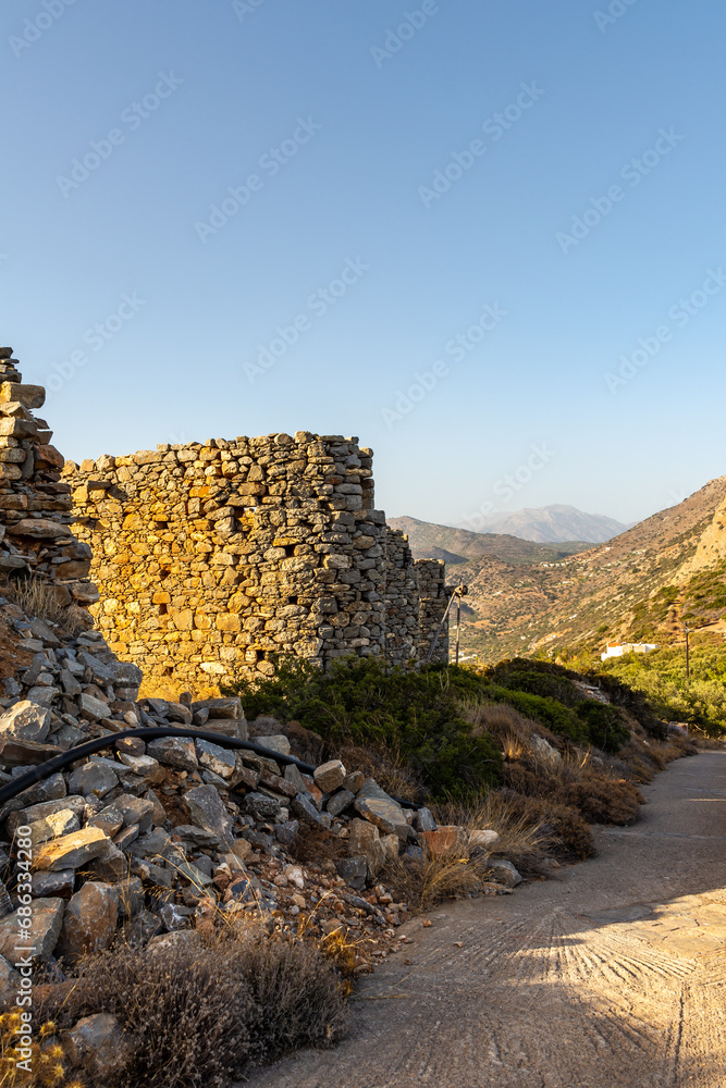 The impressive ruins of the Vrouhas windmills on a beautiful sunny day.  Crete, Greece.