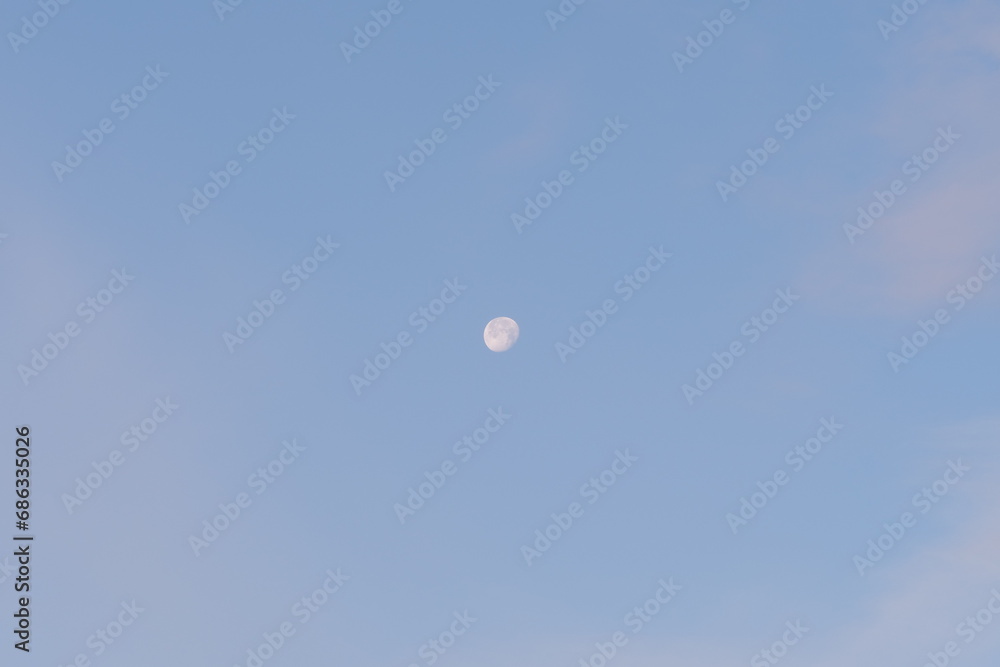 the moon in the sky during the day the moon in the sky during the day