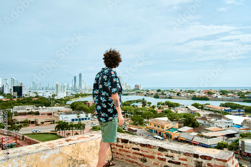 Landscape of Cartagena de Indias with man on his back, Colombia photo