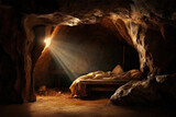 Empty bed in a cave with streaming light. Concept of resurrection and faith.