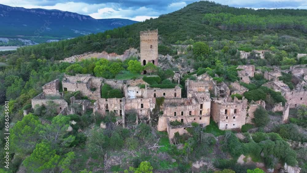 Abandoned town of Ruesta. Aerial view from a drone. In the surroundings of the Yesa Reservoir and the Aragón River. Jacetania region. Saragossa. Aragon. Spain. Europe Abandoned town of Ruesta. Aerial view from a drone. In the surroundings of the Yesa Reservoir and the Aragón River. Jacetania region. Saragossa. Aragon. Spain. Europe