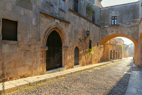 Fototapeta Naklejka Na Ścianę i Meble -  Old medieval street in the historical part of Rhodes.