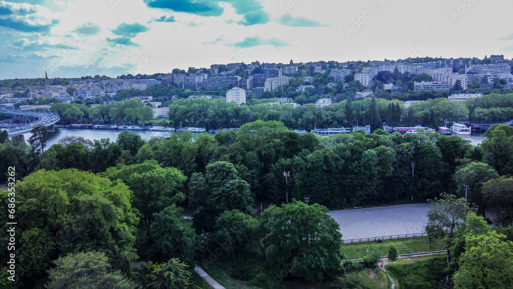 Drone point of view on Park Edmond de Rothschild and Seine river and Saint-Cloud district