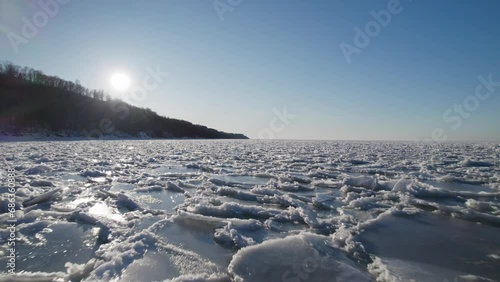 North nature ice landscape with a lot of ice floes. Drone aerial top view of Gulf of Finland. Baltic sea in winter