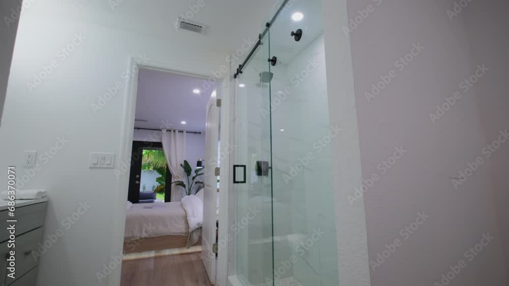 Modern Tiled Bathroom with Shower in Private home, real estate interior. Move footage Modern Tiled Bathroom with Shower in Private home, real estate interior. Move footage