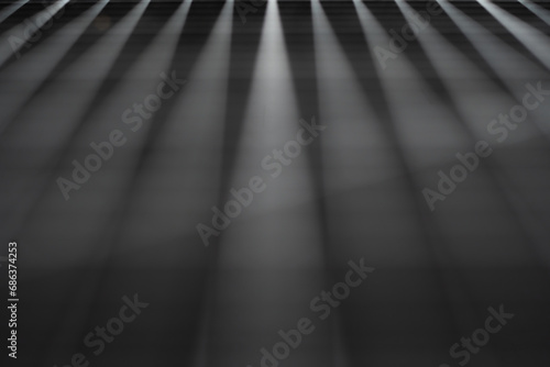 Row with light rays from spot lights abowe. Abstract copy space background. photo