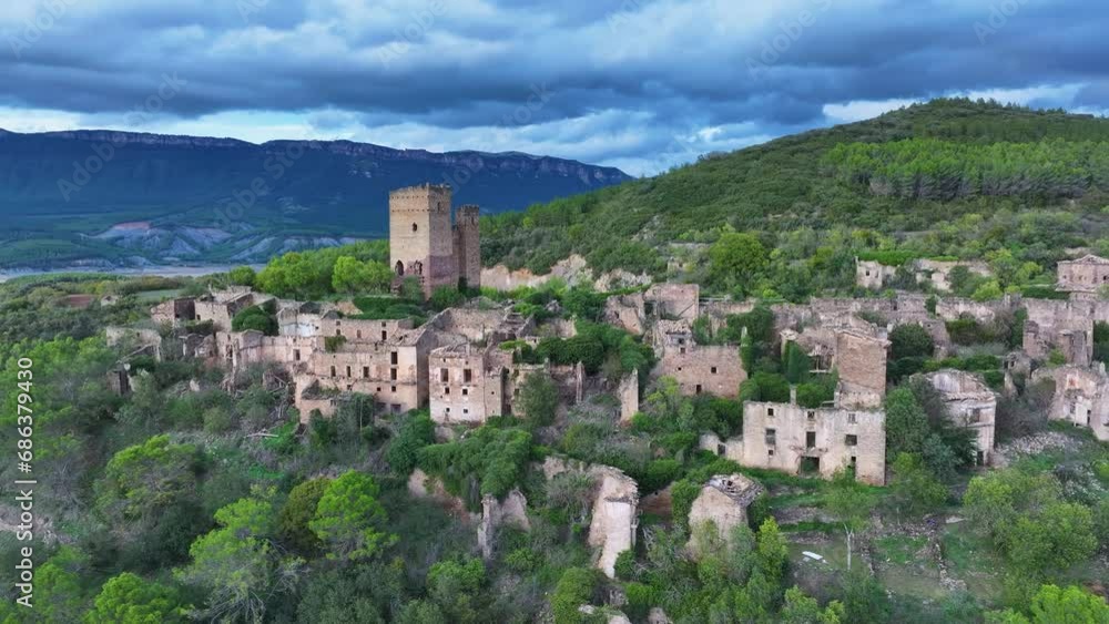 Abandoned town of Ruesta. Aerial view from a drone. In the surroundings of the Yesa Reservoir and the Aragón River. Jacetania region. Saragossa. Aragon. Spain. Europe Abandoned town of Ruesta. Aerial view from a drone. In the surroundings of the Yesa Reservoir and the Aragón River. Jacetania region. Saragossa. Aragon. Spain. Europe