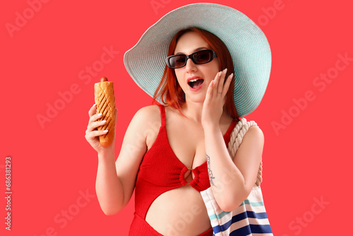 Surprised young woman in sw...