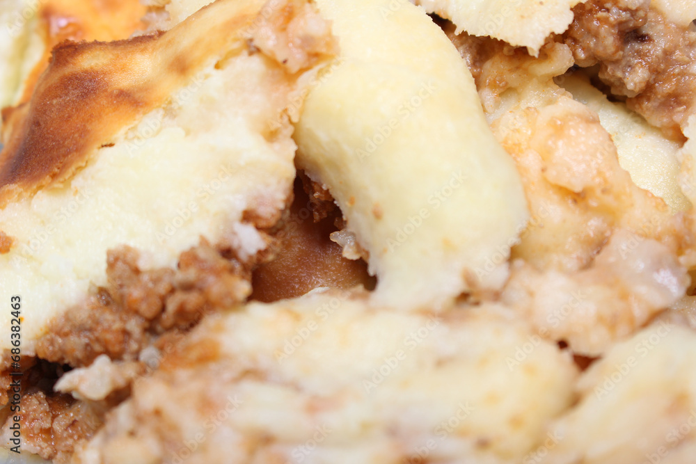 pieces of a dish made of potatoes and meat called Madalena. meal details. food details. pieces of a dish made of potatoes and meat called Madalena. meal details. food details.