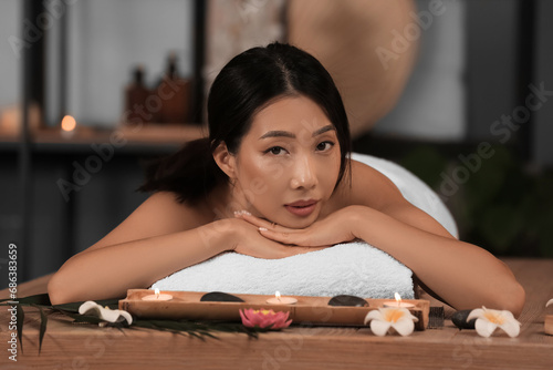 Beautiful Asian woman relax...