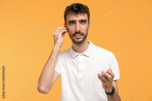 Young man with earphones on...