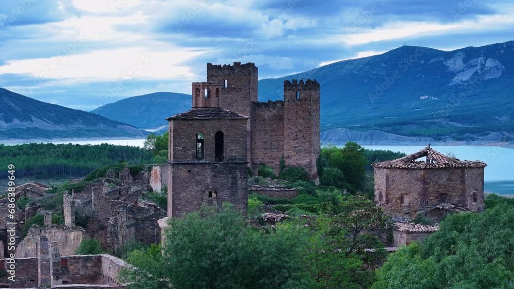 Abandoned town of Ruesta. Aerial view from a drone. In the surroundings of the Yesa Reservoir and the Aragón River. Jacetania region. Saragossa. Aragon. Spain. Europe Abandoned town of Ruesta. Aerial view from a drone. In the surroundings of the Yesa Reservoir and the Aragón River. Jacetania region. Saragossa. Aragon. Spain. Europe
