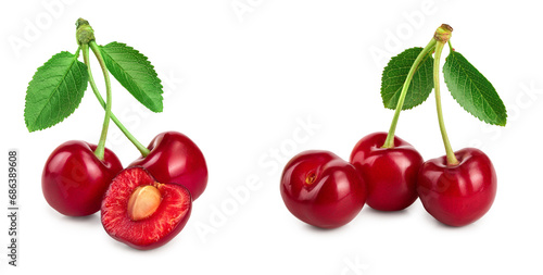 Some cherries with leaf and cut closeup isolated on white background