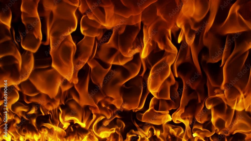 Super Slow Motion Shot of Beautiful Structured Flame Background Isolated on Black at 1000fps. Super Slow Motion Shot of Beautiful Structured Flame Background Isolated on Black at 1000fps.