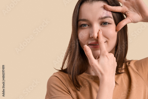 Young woman doing face buil...