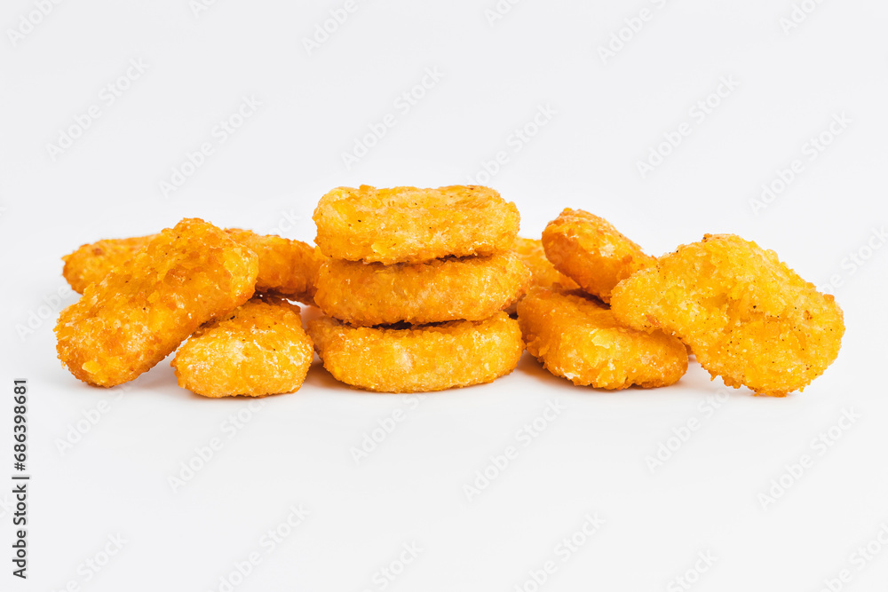 Breaded Chicken Inner Fillet on a White Background,Chicken Breaded Raw Meat.Chicken Breaded Fillet.Fast food. Fast cooking. Breaded chicken nuggets. Homemade food at home. Breaded Chicken Inner Fillet on a White Background,Chicken Breaded Raw Meat.Chicken Breaded Fillet.Fast food. Fast cooking. Breaded chicken nuggets. Homemade food at home.