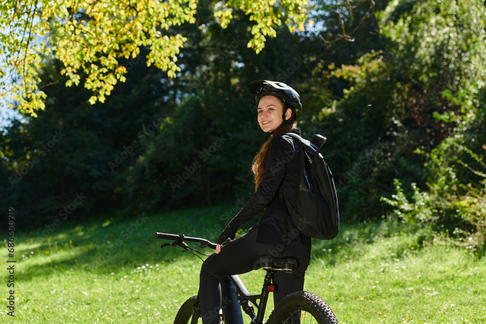 In the radiant embrace of a sunny day, a joyous girl, adorned in professional cycling gear, finds pure bliss and vitality as she cruises through the park on her bicycle, her infectious laughter In the radiant embrace of a sunny day, a joyous girl, adorned in professional cycling gear, finds pure bliss and vitality as she cruises through the park on her bicycle, her infectious laughter