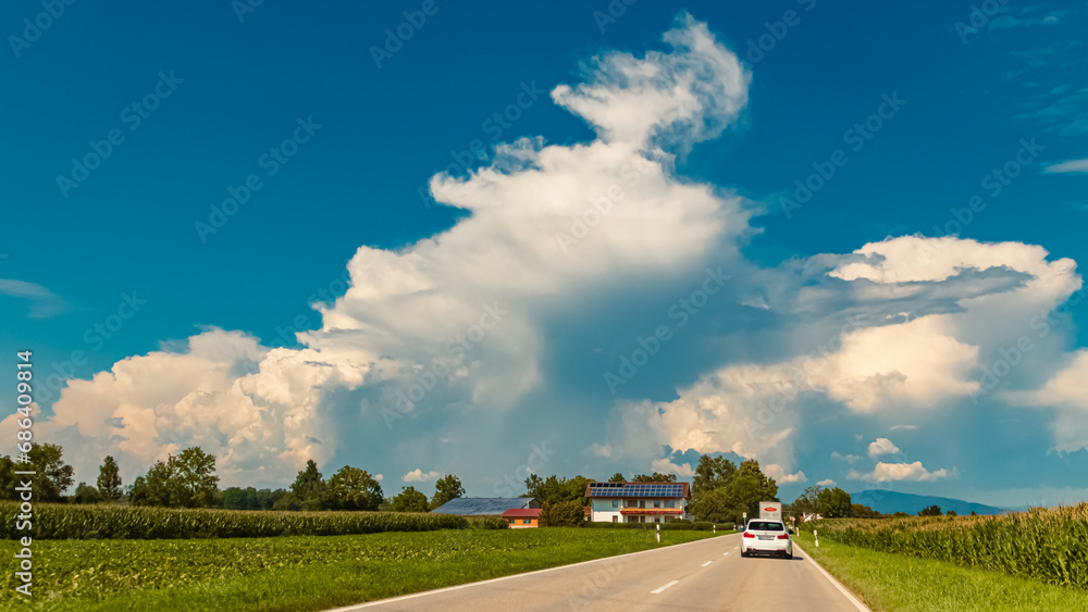 Summer view with dramatic clouds near Tabertshausen, Deggendorf, Bavaria, Germany