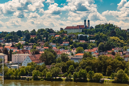 Cloudy summer view with a monastery at Vilshofen, Danube, Bavaria, Germany