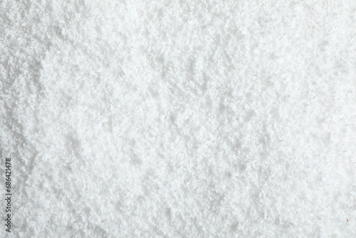 Pile of white snow as background, top view