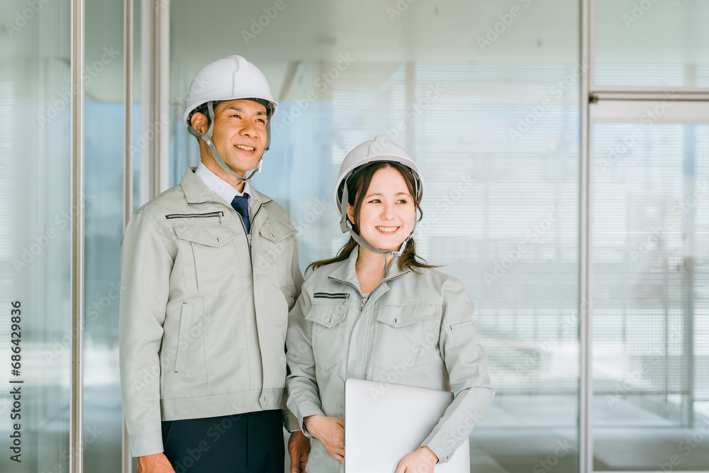 まちづくり・電気工事・電力会社・建築士・設計士・エンジニア・保守・点検・建設・建築・に作業着姿の男女
まちづくり・電気工事・電力会社・建築士・設計士・エンジニア・保守・点検・建設・建築・に作業着姿の男女