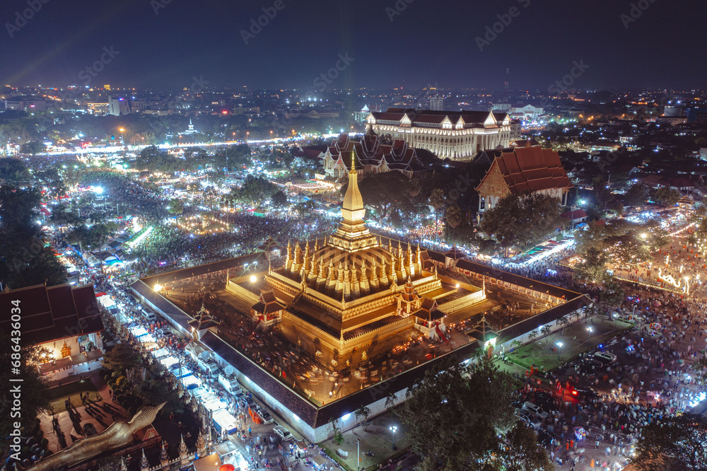 Phra That Luang Festival, Drone Shot Hight angle Vientiane at night candlelight, Lao PDR