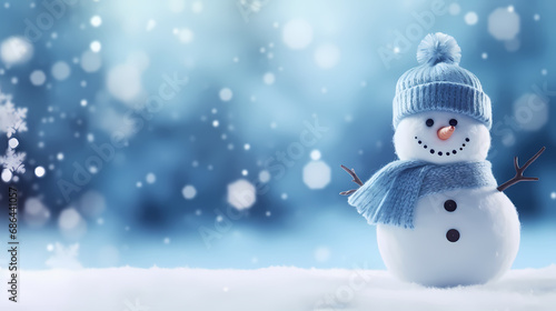 Little snowman in the blurred snow background banner,Christmas background