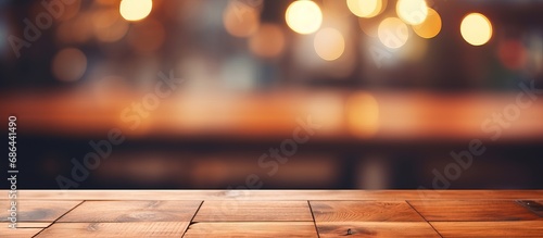 Blurry background with wooden table in close up photo