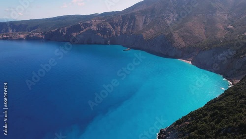 Flying over Myrtos beach, Kefalonia, during the summer, Greek Ionian Islands.