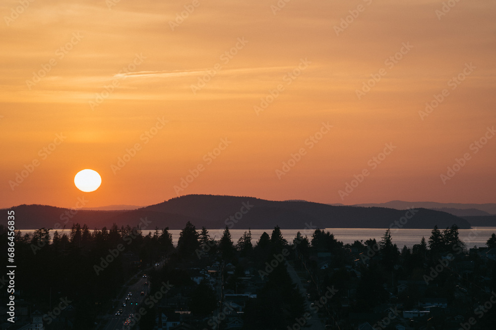Obraz premium View of Anacortes from Cap Sante Park on Fidalgo Island at sunset in the San Juan Islands in northwest Washington 