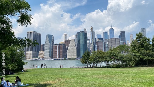Canvas Print A crowd on a sweltering hot summer day in BROOKLYN BRIDGE PARK in DUMBO, New York in 2022