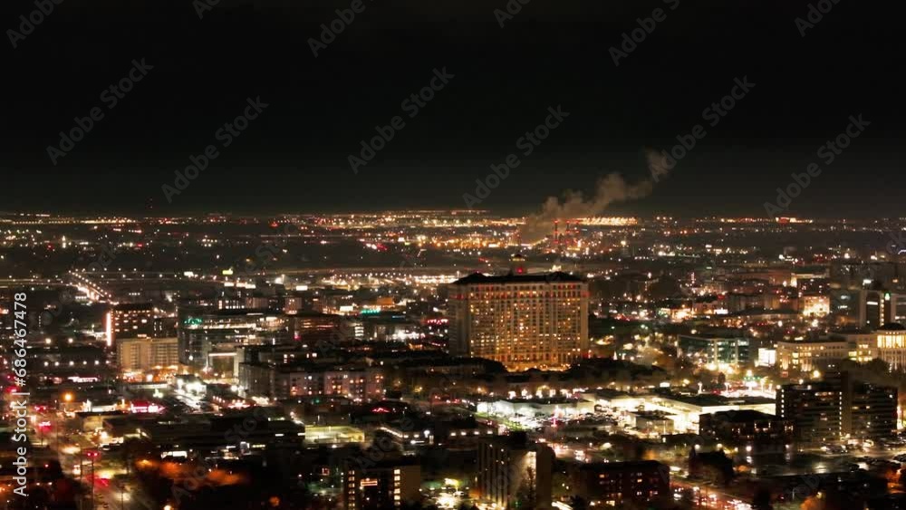 Drone flyover shot of salt lake city, utah at night with industrial buildings Drone flyover shot of salt lake city, utah at night with industrial buildings