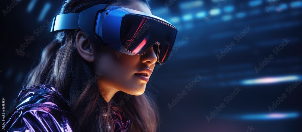 Futuristic woman in modern VR glasses interacts with network in virtual reality. AI game with AR, future technology. Neon blue light. Futuristic woman in modern VR glasses interacts with network in virtual reality. AI game with AR, future technology. Neon blue light.