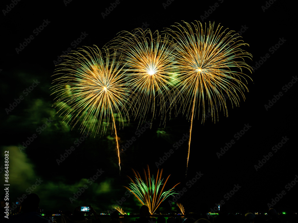 Fireworks show under defocus or blur concepts with isolated black background at night, this celebration is for the International Fireworks Festival in Pattaya on Nov 24-25 in Thailand Fireworks show under defocus or blur concepts with isolated black background at night, this celebration is for the International Fireworks Festival in Pattaya on Nov 24-25 in Thailand