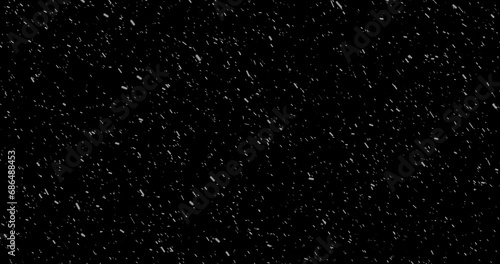 Cinematic snowfall loop animation of a surreal realistic snowflake falling bg. Snowfall winter overlay slowly falls on a black backdrop. Snowflake for Christmas new year 2024,2025.