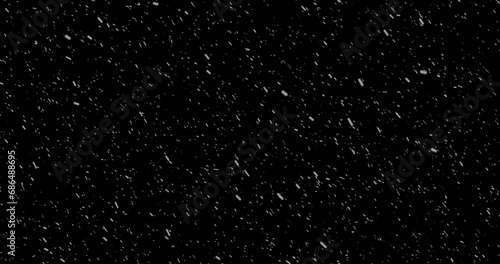 Cinematic snowfall loop animation of a surreal realistic snowflake falling bg. Snowfall winter overlay slowly falls on a black backdrop. Snowflake for Christmas new year 2024,2025. photo